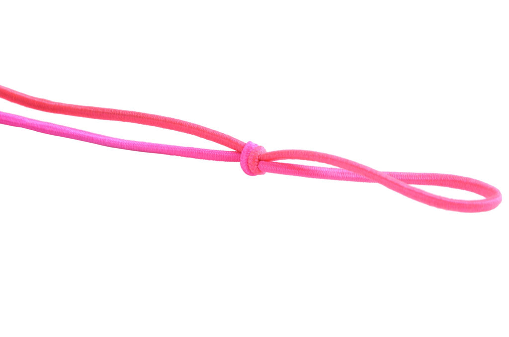Two strands of pink elastic beading cord tied in a knot against a white background