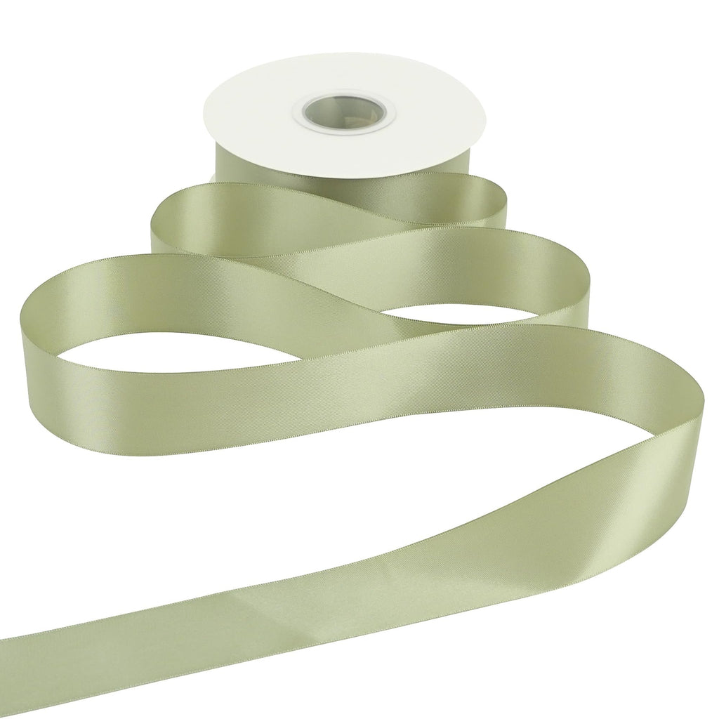 Roll of dusty sage satin ribbon unfurled against a white background, showing the texture and sheen.