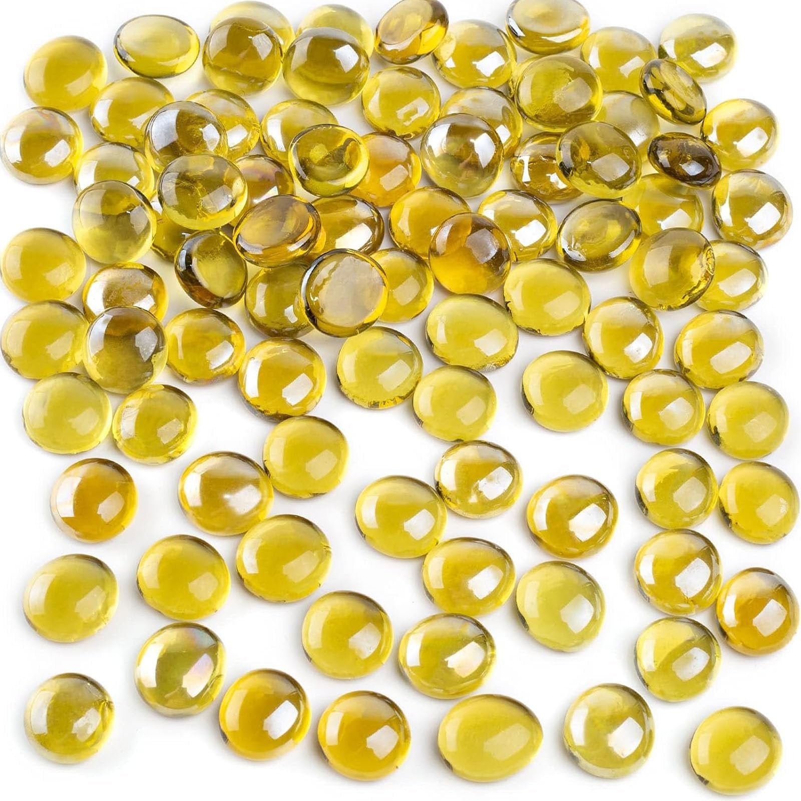 Pile of amber flat glass marbles, 0.6-0.7 inch diameter, scattered on a white background.