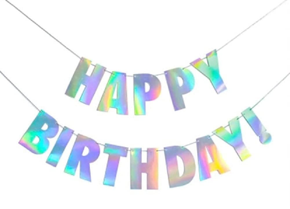 Holographic iridescent white 'Happy Birthday' banner strung on silver cords against a white background.
