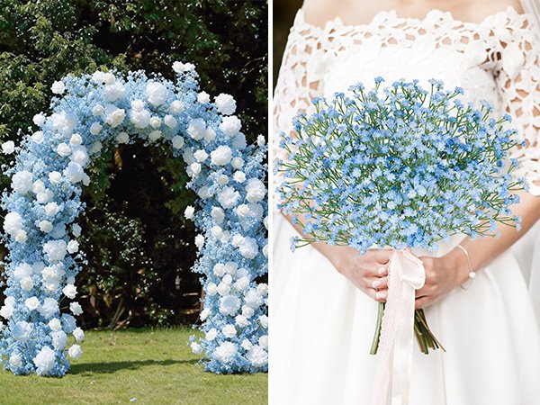 Blue and white floral wedding arch and bride holding a bouquet of blue baby's breath flowers