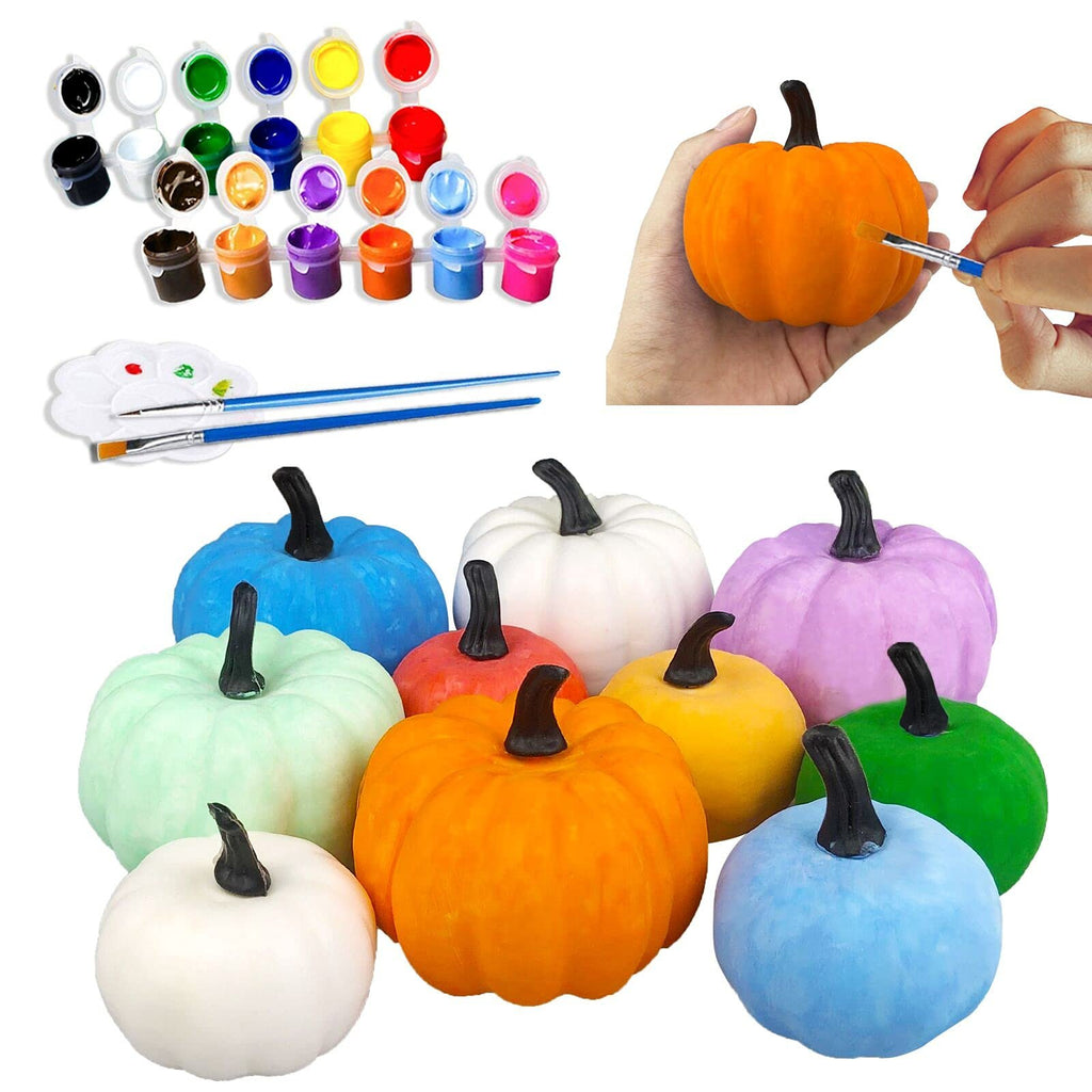 Paint-your-own pumpkin decorating kit with multiple colored pumpkins, paints, brushes, and palette