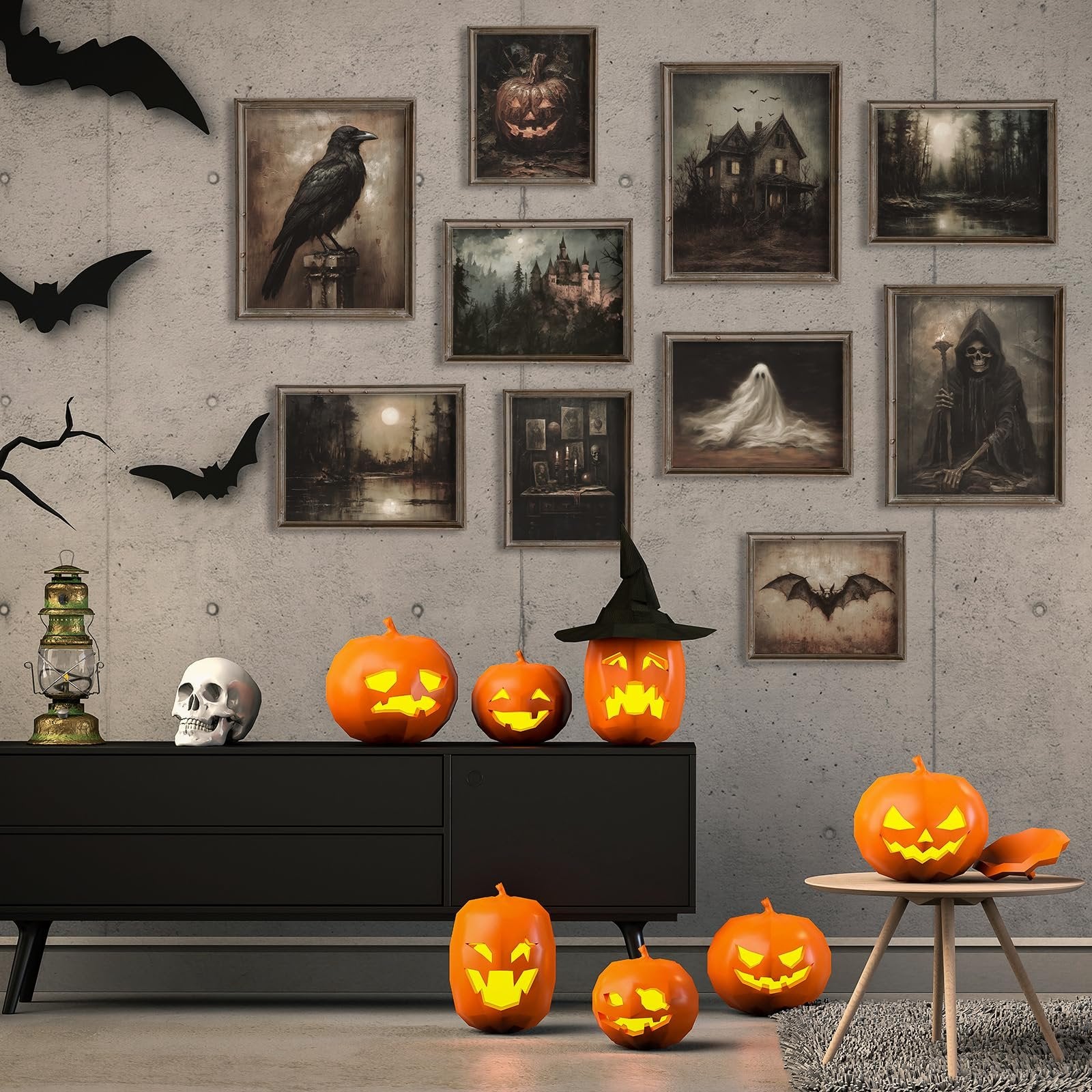 Halloween wall art prints featuring spooky scenes like a crow, haunted house, and grim reaper, displayed on a concrete wall with pumpkins and bats.