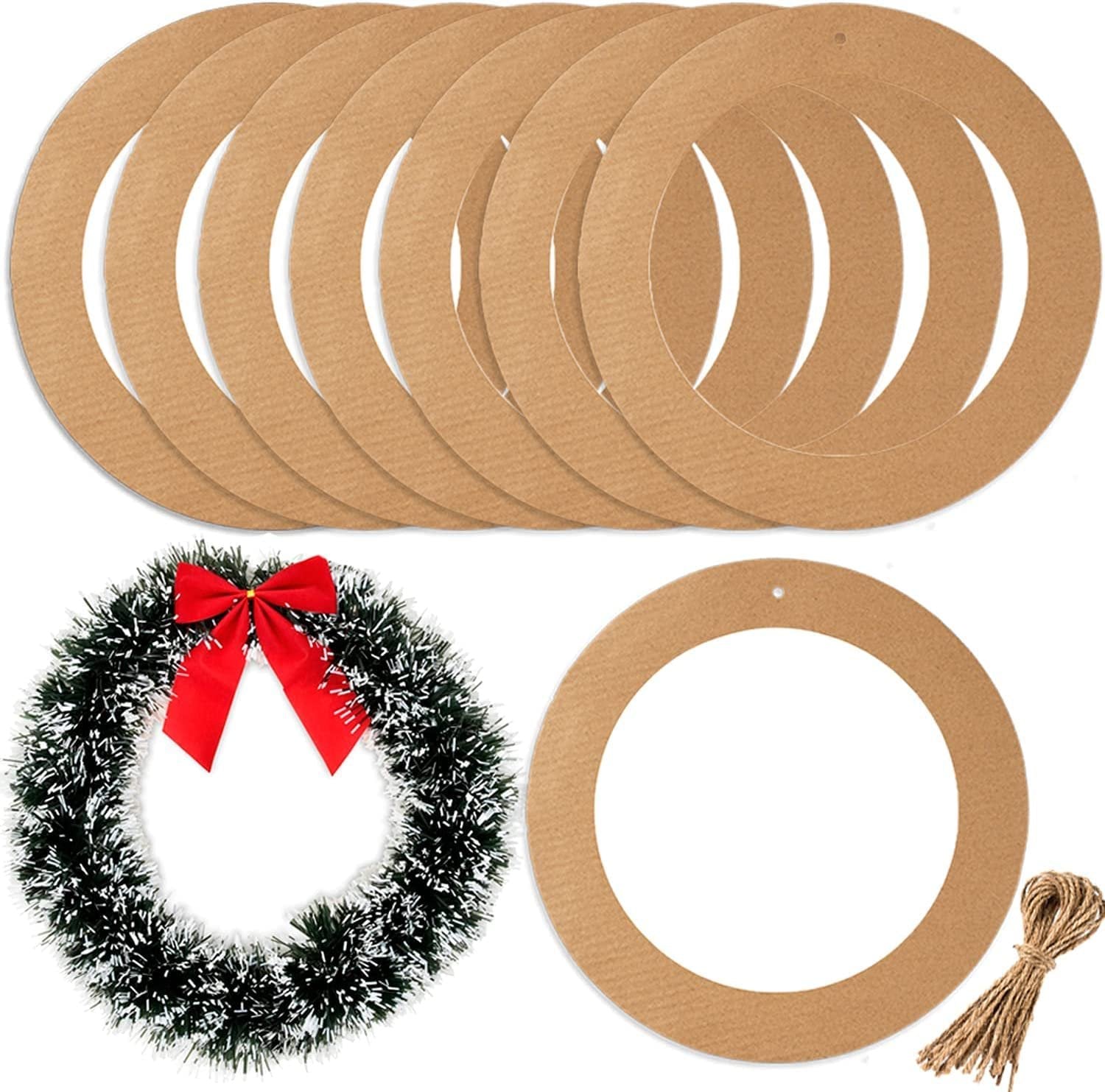 Ten cardboard wreath rings and a sample wreath with red bow, plus twine bundle