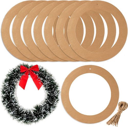 Ten cardboard wreath rings and a sample wreath with red bow, plus twine bundle