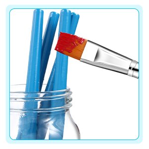Flat nylon paint brush with red paint dipping into a jar of blue handled brushes