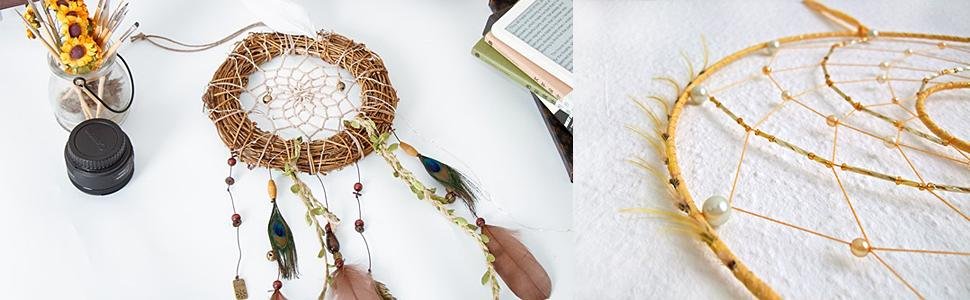 Dream catcher with feathers and beads, displayed with craft supplies and a book.