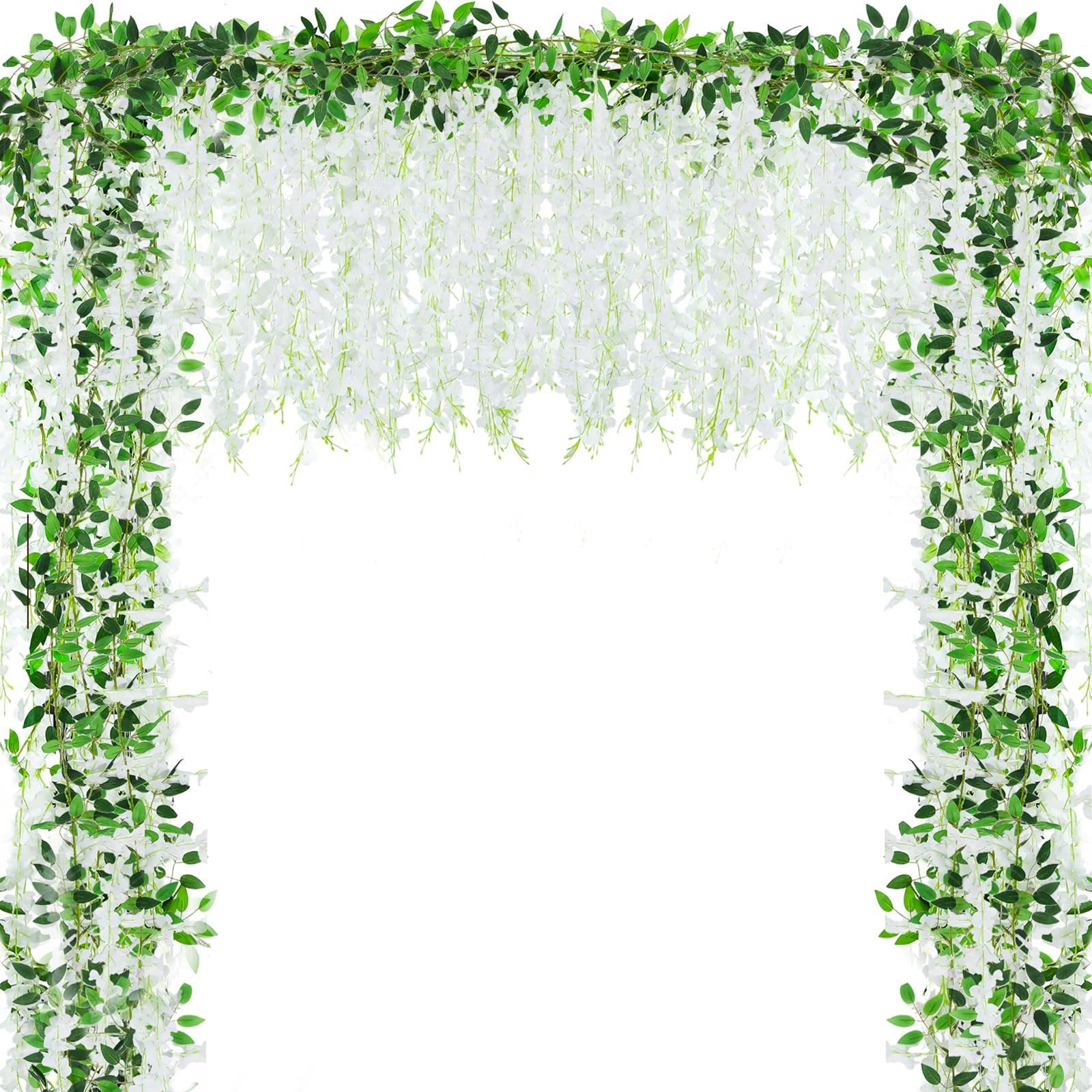 White artificial wisteria garland with green leaves draped in an arch shape against a white background.