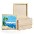 Stack of 10 unfinished birch wood cradled painting panels with one panel showing a textured beach and ocean painting