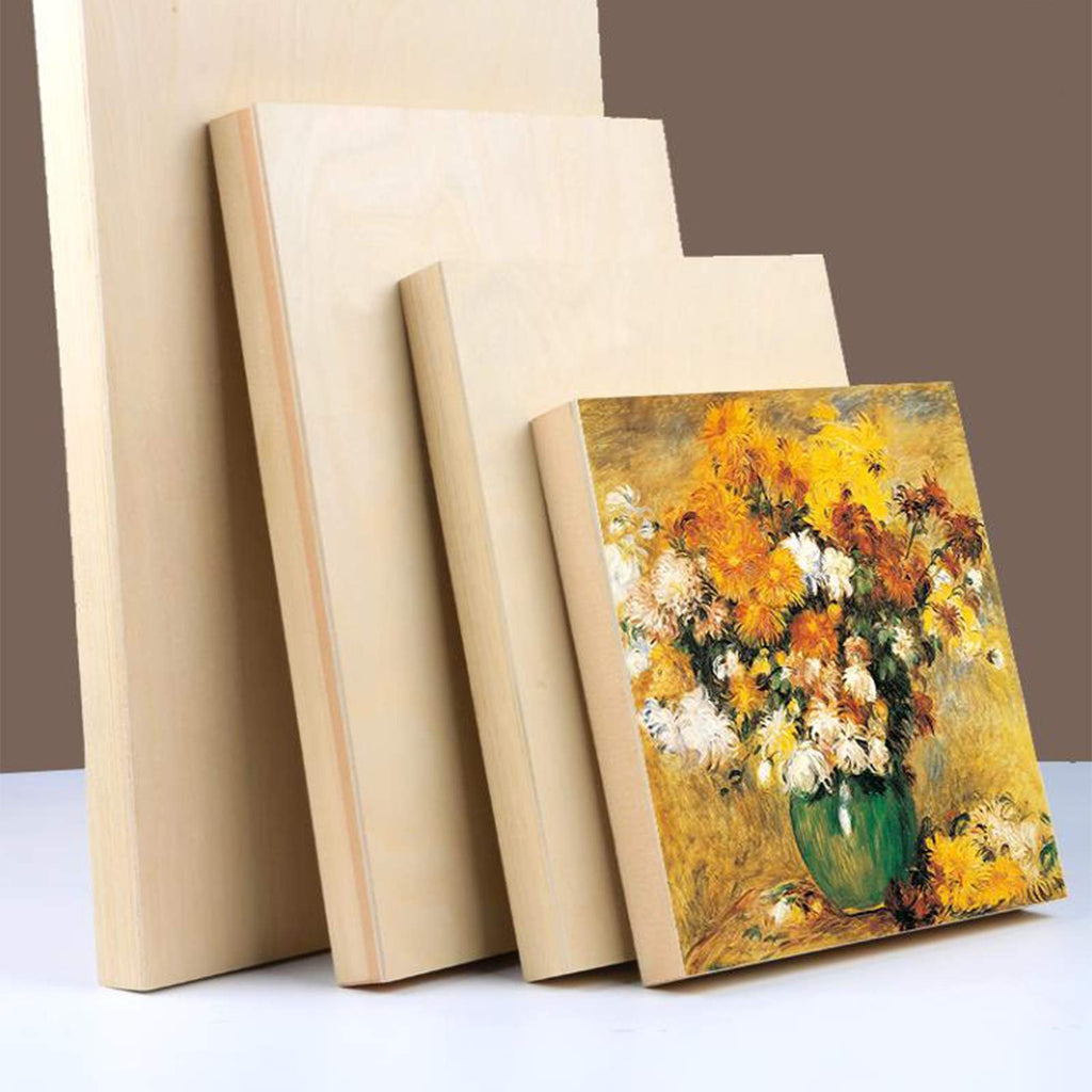 Four unfinished birch wood painting panels of varying sizes, one with a floral still life painting on its surface, displayed on a white surface.