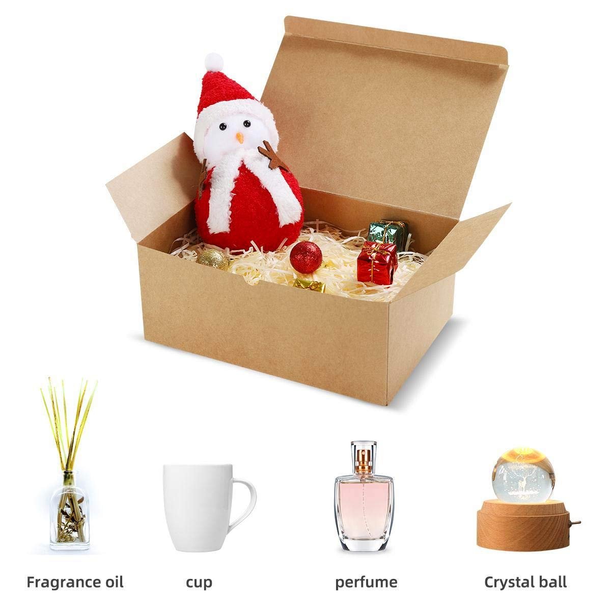 Brown cardboard gift box with lid open, containing a plush snowman, red and green wrapped gifts, and shredded filler. Below are separate images of fragrance oil, a white cup, perfume, and a crystal ball.