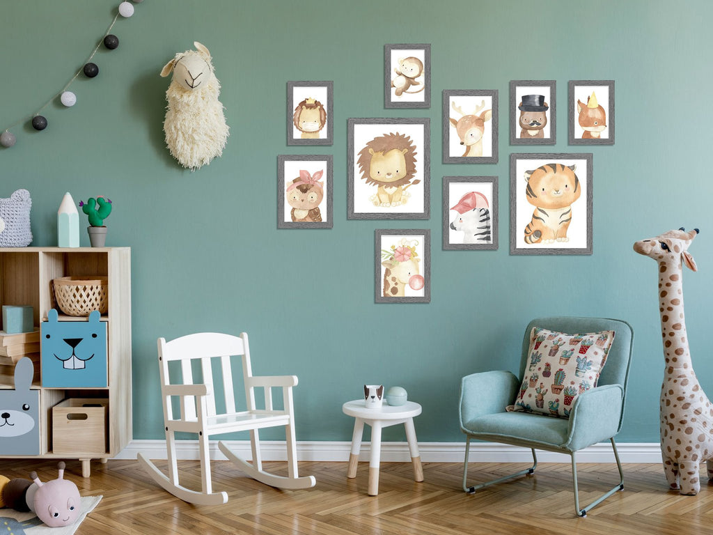 Nursery room with a gallery wall of framed animal prints, a rocking chair, and a stuffed giraffe.