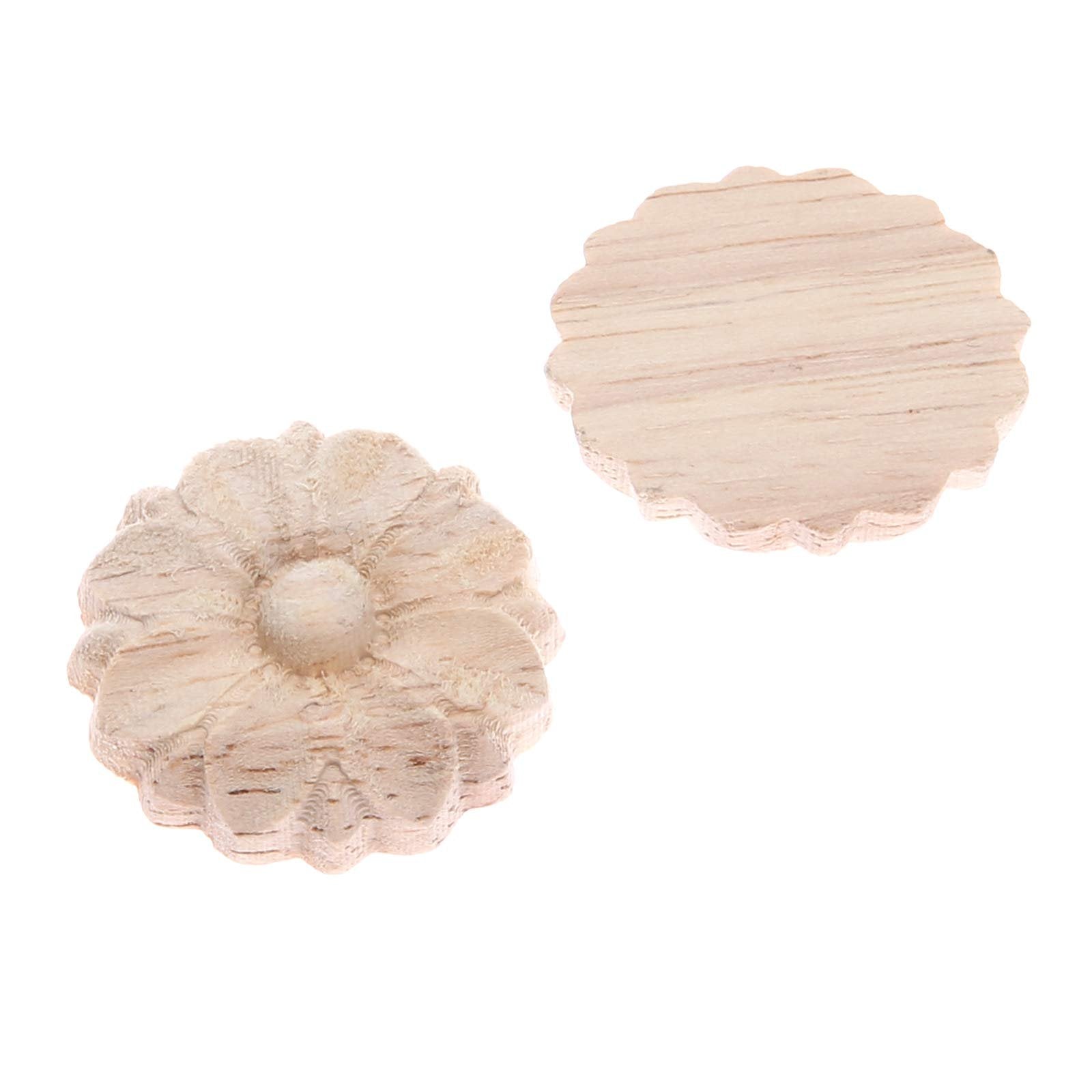 Two unpainted wooden rosette onlay appliques with carved flower details on a white background.