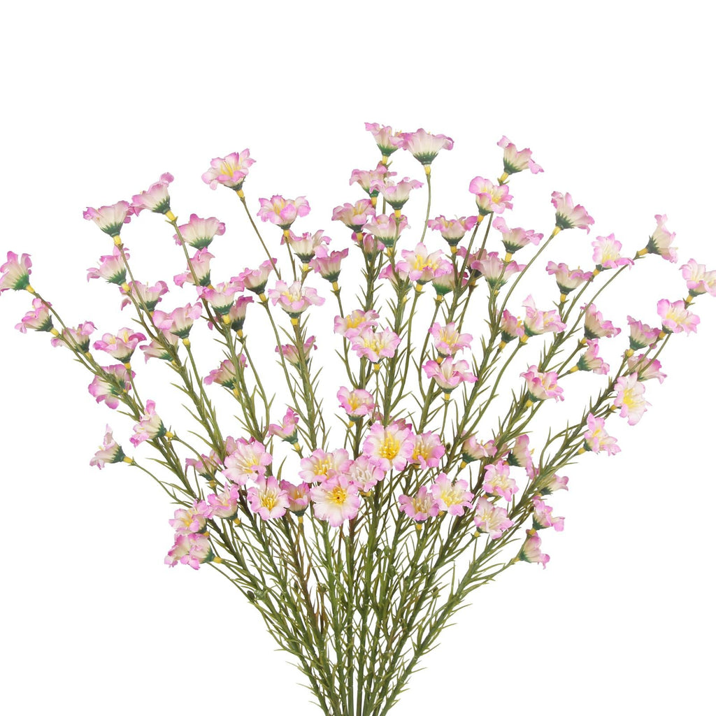 Bouquet of artificial pink forsythia branches with delicate white and yellow centers, set against a white background.