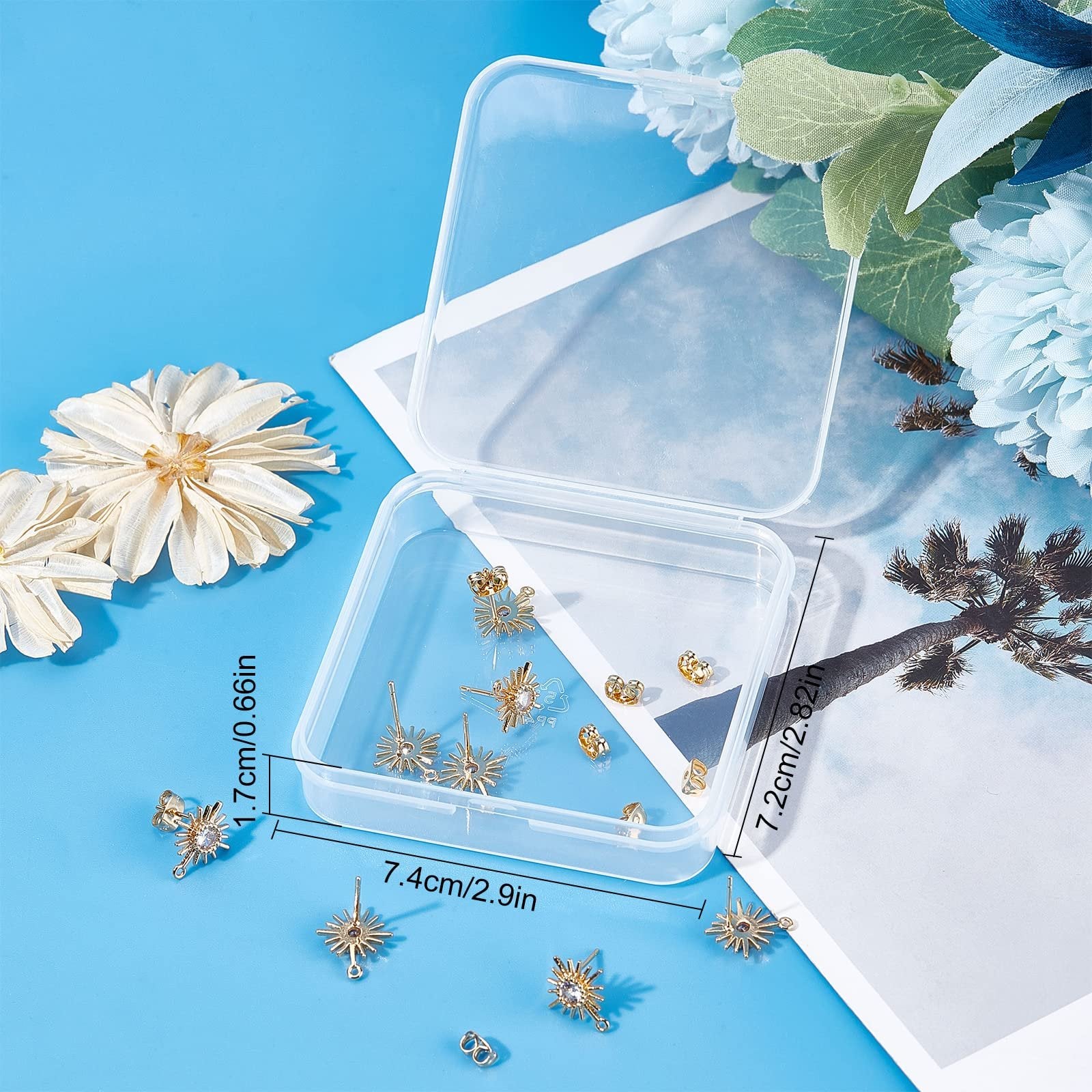 Gold plated sun earring findings with cubic zirconia and butterfly backs in a clear plastic box, with dimensions indicated.