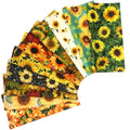 Ten 25x25cm cotton fabric squares with various sunflower prints fanned out against a white background.