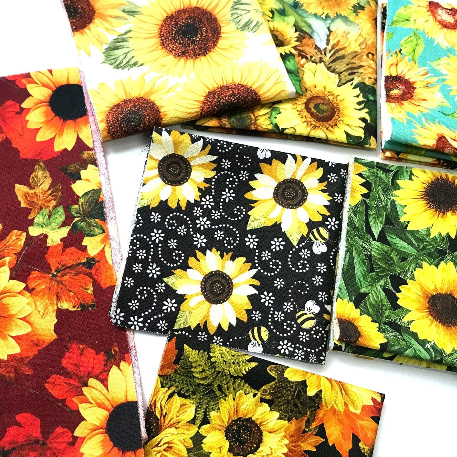 Assorted 100% cotton fabric squares with sunflower and fall leaf prints, arranged on a white background.