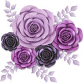Group of five 3D paper flowers in shades of purple and lavender with light purple leaves against a white background.