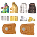 Assortment of sewing thimbles and finger protectors in various metals and leather