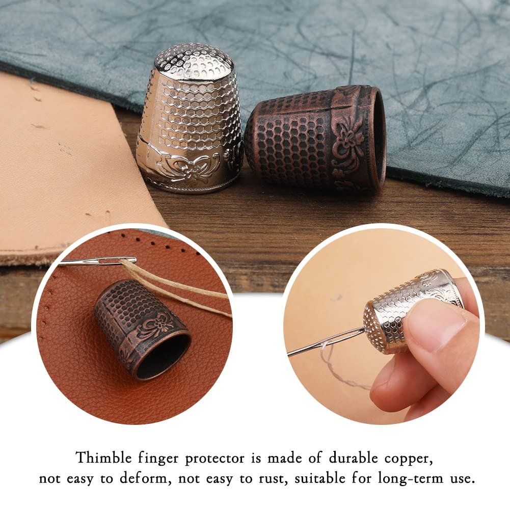 Two decorative metal thimbles for hand sewing, one silver and one bronze, with inset circular images showing thimbles in use.