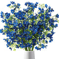 Bouquet of 10 blue baby's breath silk flowers in a white vase, close-up view