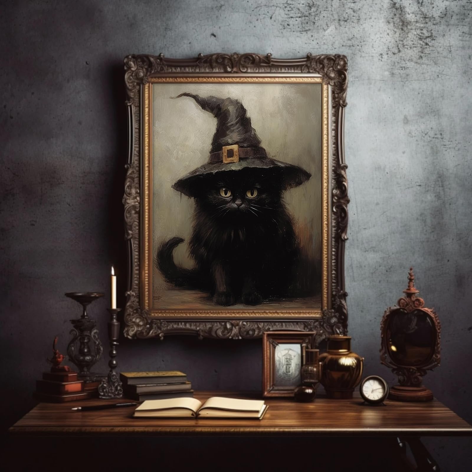 Gothic black cat wearing a witch hat in a framed painting, displayed on a table with books and decor.