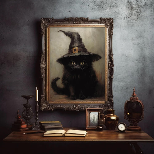 Gothic black cat wearing a witch hat in a framed painting, displayed on a table with books and decor.