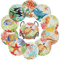 Ten ocean-themed diamond painting coasters with various sea creatures and coral, displayed in a black metal holder.