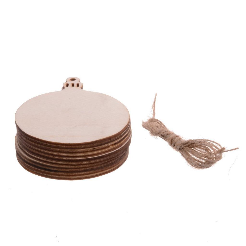Stack of round unfinished wood Christmas ornaments with a bundle of twine on a white background.