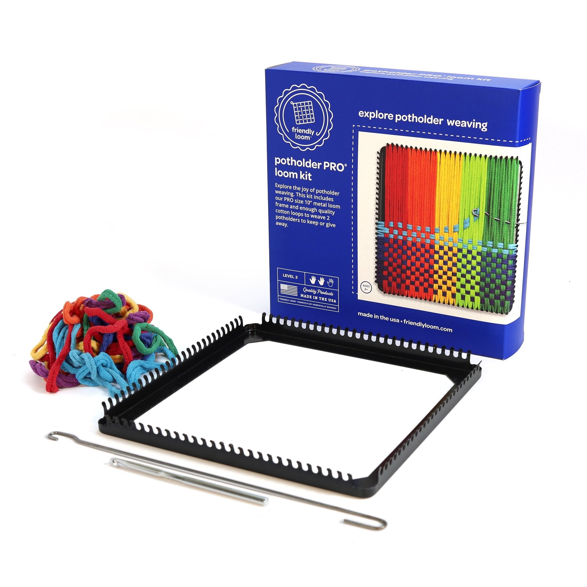 Potholder weaving loom kit with colorful cotton loops, metal loom frame, and tools, next to its product box.
