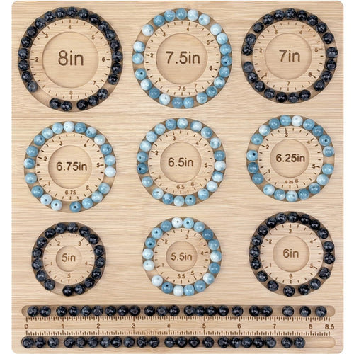 Bamboo beading board with bracelets arranged in size circles and beads in storage slots.