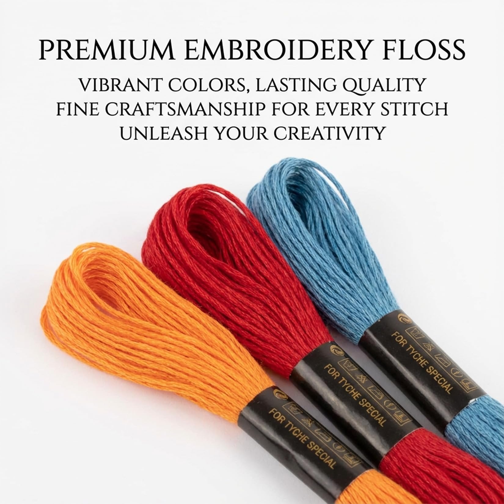 Three spools of embroidery floss in orange, red, and blue, with black labels showing care symbols and text.