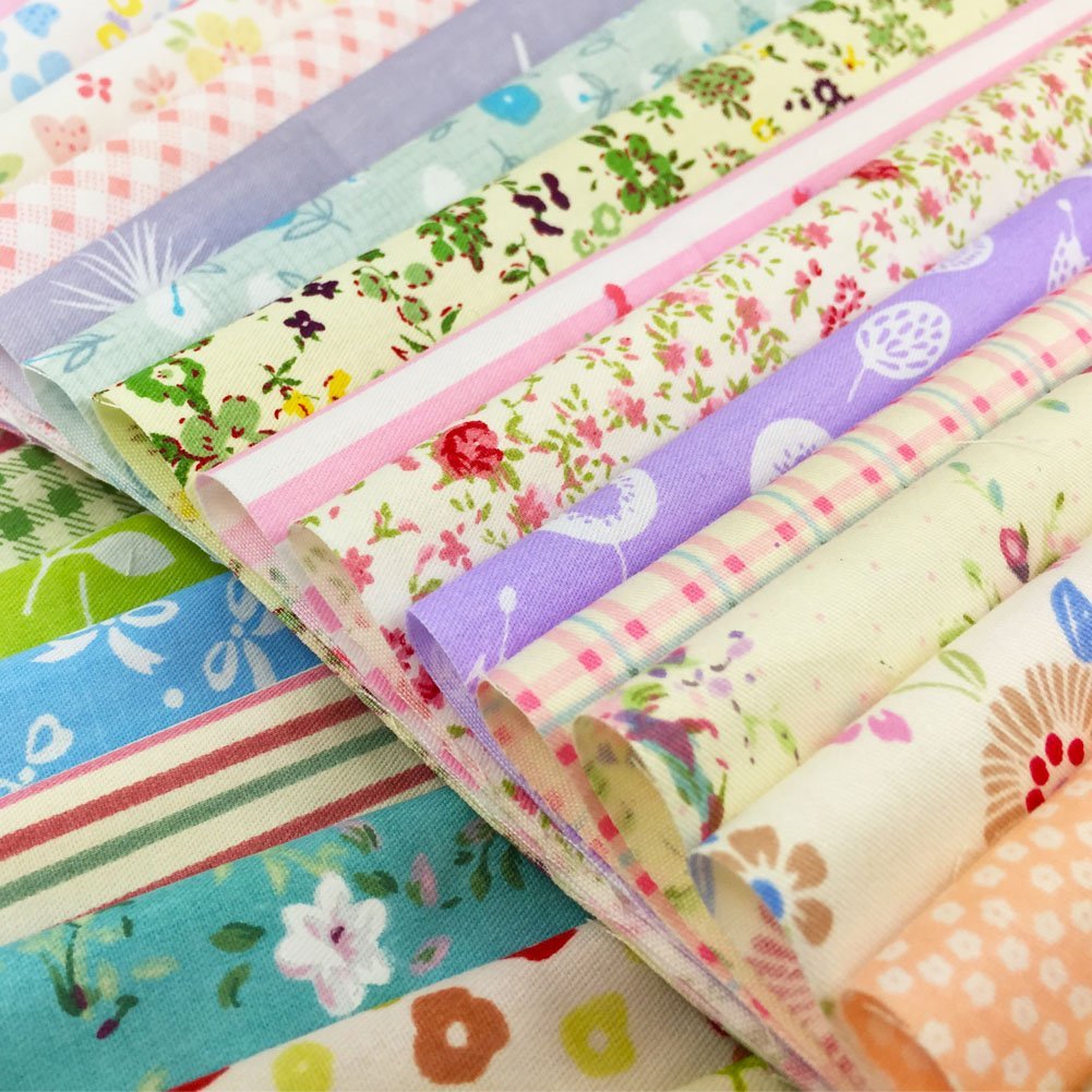 Stack of assorted floral, polka dot, stripe, and gingham fabric squares for crafts.