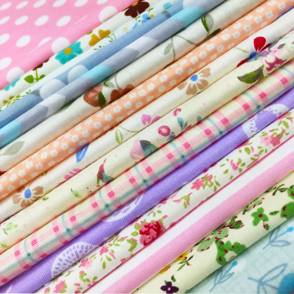Stack of colorful floral and polka dot cotton quilting fabric squares, 6x6 inch precut.