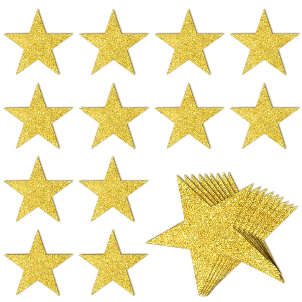 Glitter gold paper star cutouts arranged on a white background, showing a stack of stars and individual stars.