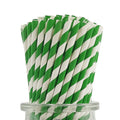 Bundle of green and white striped paper drinking straws in a glass jar