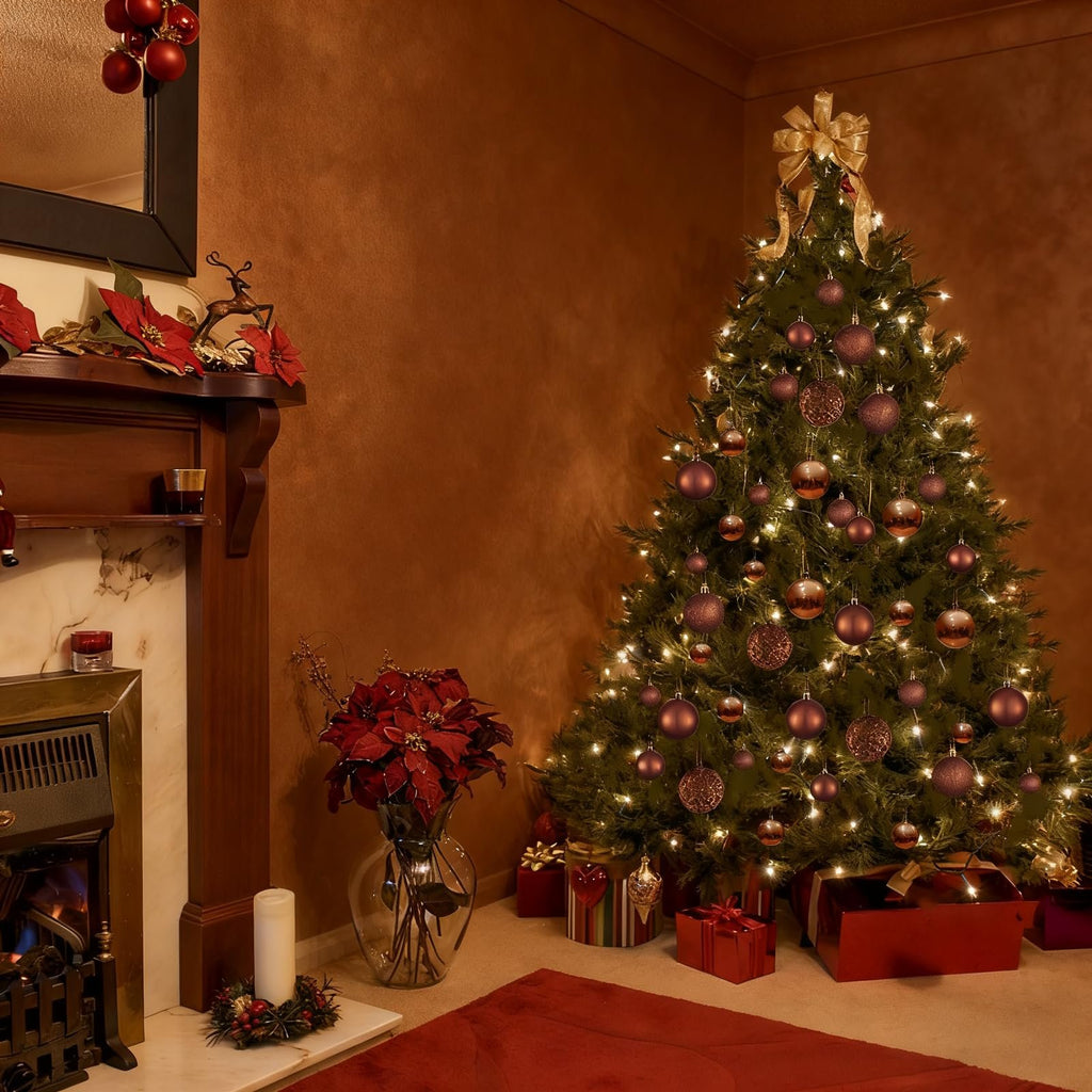 Christmas tree decorated with brown ornaments and lights, next to a fireplace with poinsettias and gifts.