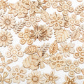 Assortment of 20mm unfinished wooden flower and leaf craft cutouts scattered on a white background.