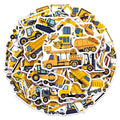 Pile of assorted construction vehicle vinyl stickers including dump trucks, excavators, and cranes.