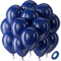 Pile of navy blue latex balloons with curling ribbons and a roll of blue tape on a white background.