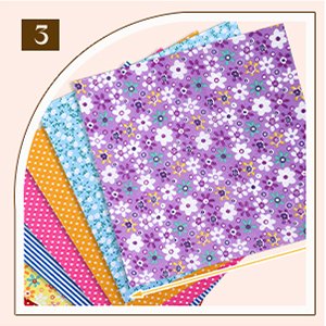 Stack of 10x10 inch floral printed cotton fabric squares for quilting and crafts