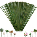 Bundle of 100 green floral stem wires fanned out with various artificial flowers and leaves at the bottom.