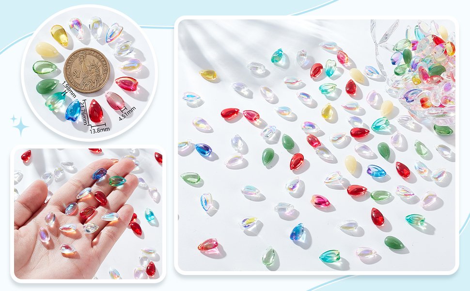 Assorted teardrop-shaped glass beads in various colors, shown with a coin for scale and in a hand.