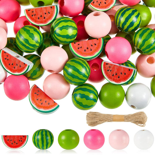 Assorted watermelon slice and round wooden beads in pink, green, and white, with a bundle of twine.