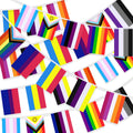 Multiple strings of LGBTQ pride flag bunting with various designs and colors, displayed against a white background.