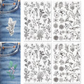 Embroidery patterns on denim fabric showing a branch with berries and leaves, and a separate sheet with multiple floral designs.