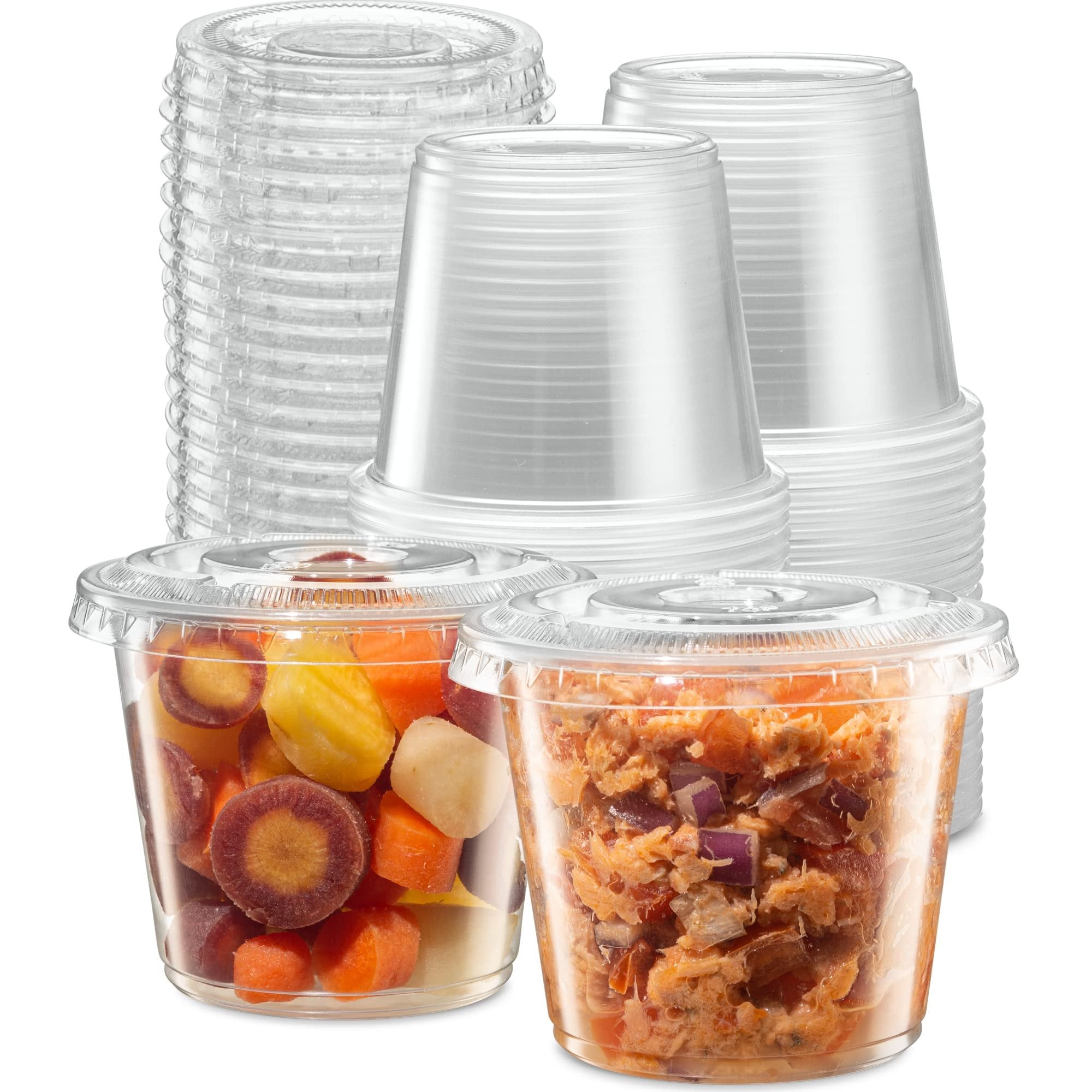 Stack of clear plastic portion cups with lids, two filled with chopped vegetables and salmon salad