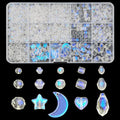 Assorted crystal glass beads in various shapes and sizes, including stars and moons, displayed in a clear organizer box and arranged below.