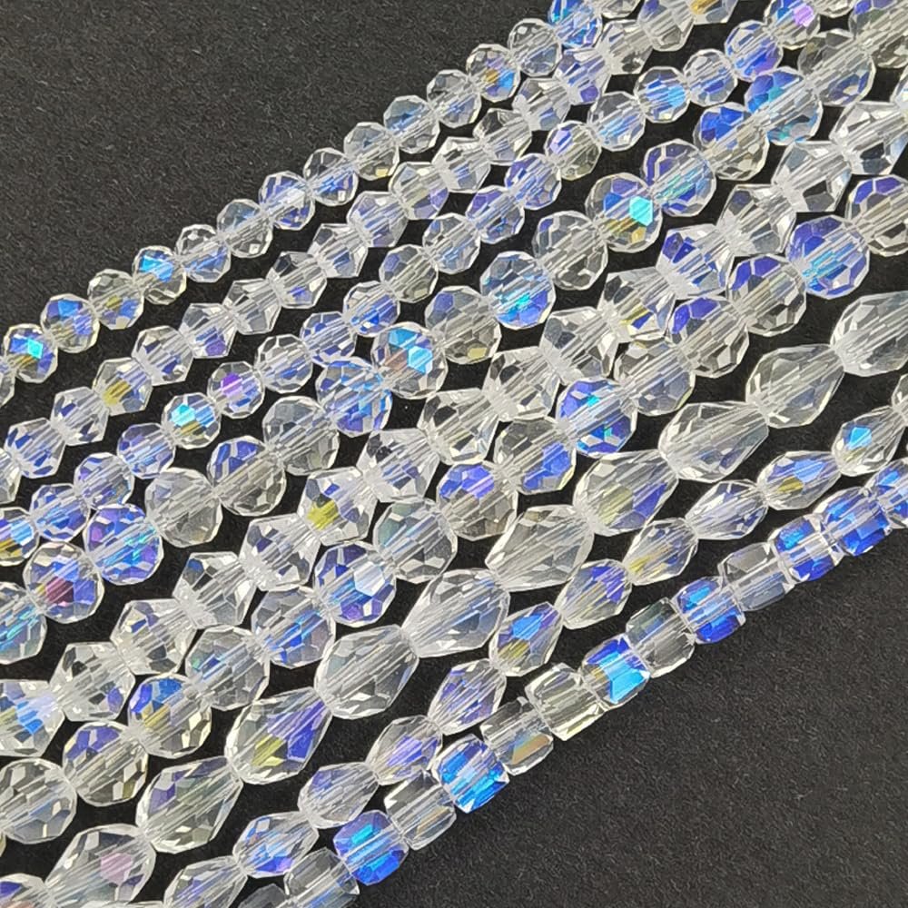 Assorted clear crystal glass beads with AB finish arranged in rows on a black background.