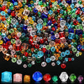 Assorted faceted glass beads in various shapes, sizes, and colors, displayed in a pile with individual beads shown below.